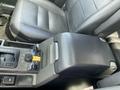 Interior view of a 2006 Land Rover LR3 showing the center console with control knobs and a leather seat