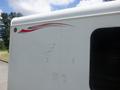 2004 Royal 18 Foot Office Trailer featuring a white exterior with red and green decorative stripes along the side