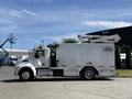 A 2009 Kenworth T270 truck with a silver body and a raised aerial work platform on top