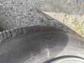 A close-up of a tire showing the tread pattern and details of a 2007 Chrysler PT Cruiser tire