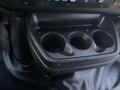 Cup holder with three compartments in a 2017 Chevrolet Express