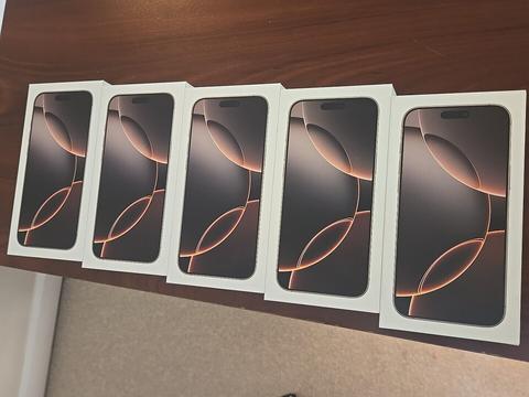 Five Apple iPhone 16 Pro Max devices in gold gray packaging arranged in a row