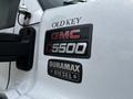 A 2006 GMC C5500 badge featuring the text GMC C5500 and Duramax Diesel