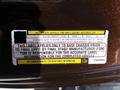 Label attached to a 2015 RAM 5500 providing tire and loading information including seating capacity and weight details