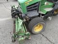 A green 2009 John Deere 2653B Precision Diesel Mower with a front cutting deck and large rubber tires
