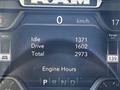 Dashboard display of a 2022 RAM 3500 showing idle hours drive hours total hours and speedometer marking 0 kmh