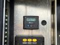 A control panel displaying a digital screen with the message "HEATER STOPPED TEMP SET: 72F" and buttons labeled for left work and right work