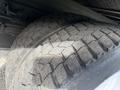 Close-up of the tire on a 2007 GMC W5500 18 foot cube van showcasing the tread pattern and rugged texture