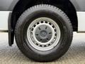 A close-up view of a 2019 Mercedes-Benz Sprinter tire showcasing the alloy wheel design and Michelin tire tread pattern