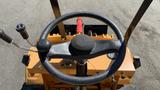 View of the steering wheel and control levers of a 2024 Traner TR45 machinery