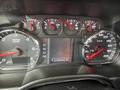 Dashboard of a 2016 Chevrolet Tahoe showing various gauges including speedometer odometer and fuel level indicators