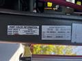 2006 Emergency One Fire Truck with a focus on the paint color information and tire specifications labels