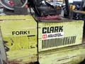A green 2000 Clark GPS 15 forklift with visible wear and tear featuring the brand name Clark and Williams Machinery on its side