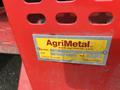A red metal tag displaying the model number and specifications of a John Deere 1585 Terrain Cut mower with labels in English and French