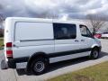 A 2016 Mercedes-Benz Sprinter van in white with a sleek design and large side windows