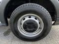 Close-up of a tire on a 2018 Ford Transit showcasing the wheel rim and tread pattern