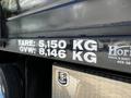 A 2015 RAM 5500 with visible weight specifications including tare weight of 5150 kg and gross vehicle weight of 8146 kg displayed on the side of the truck