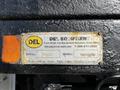 A metal plate detailing the specifications of a 2018 Ford F-550 including the serial number and model information