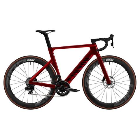 2025 Canyon Aeroad CF SLX 8 AXS Road Bike in a deep red color featuring aerodynamic frame design high-profile wheels and disc brakes