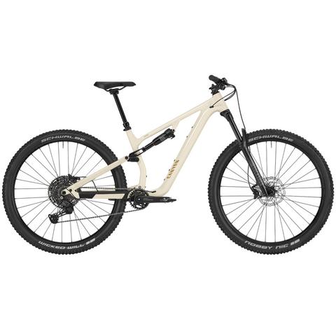A beige 2025 Canyon Neuron 5 mountain bike with wide tires a full suspension frame and a dropper seat post designed for off-road riding