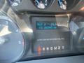 Dashboard display of a 2016 Ford F-350 SD showing trip mileage of 29.0 and total distance of 243945 km with fuel information