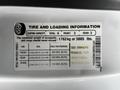A 2017 Ford F-250 tire and loading information label detailing seating capacity and weight limits for occupants and cargo