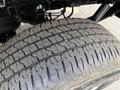 Close-up of a tire from a 2021 Ford F-150 showing detailed tread pattern and texture