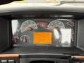 Dashboard of a 2012 Volvo VNL displaying various gauges including speedometer tachometer fuel level and an information screen with operational details