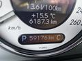 Dashboard display of a 2007 Mercedes-Benz E-Class showing mileage of 59176 km and temperature of 15.5°C along with fuel consumption and speed indicators