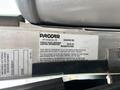 A 2013 Kenworth T370 displaying a PACCAR vehicle information label detailing chassis number, vehicle emission control information, and date of manufacture
