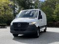 A 2020 Mercedes-Benz Sprinter van with a white exterior black grille and headlights facing forward
