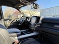 2023 RAM 3500 interior featuring a large touchscreen display stylish dashboard and spacious seating