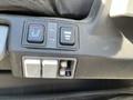 Control panel featuring buttons for seat heating and adjustment in a 2022 Freightliner Cascadia