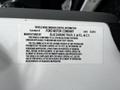 A label displaying vehicle noise emission control information for a 2013 Ford F-650 manufactured by Ford Motor Company