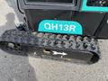 2024 AGT Industrial Green QH13R Mini Excavator with distinctive black rubber tracks and blue detailing on the side