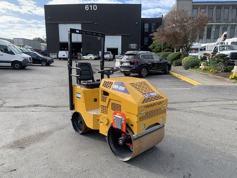 A yellow 2024 Liondi DVR roller compactor with a seated operator position and a large front drum for compacting surfaces