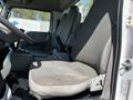 2009 Ford LCF 550 driver's seat with gray fabric upholstery positioned in the foreground of the image
