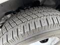 Close-up of a tire from a 2019 Chevrolet Express showcasing the tread pattern and sidewall detailing