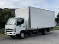 A 2020 Hino 195 truck with a large white box cargo area and a cab featuring a simple design and prominent headlights
