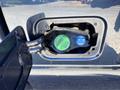 A fuel filler cap with labels for diesel and an emissions control device on a 2014 Ford F-250 SD