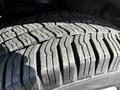 Close-up of the tread of a tire from a 2017 Ford F-150 showing deep grooves and detailed patterns for traction