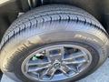 A 2023 Ford Bronco Sport tire featuring a Continental ProContact tread design with five-spoke alloy wheel rim