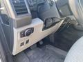 Interior view of a 2017 Ford F-150 dashboard showing control knobs and buttons near the driver's seat