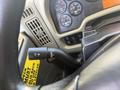 Close-up of the control lever in a 2017 International 4300 truck featuring various settings for wipers and turn signals
