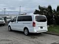 A white 2018 Mercedes-Benz Metris parked with its rear doors closed and windows tinted