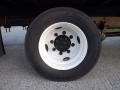 Close-up of a white wheel with a black tire on a 2014 International Durastar truck