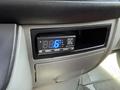 A digital display unit with a blue LED indicator mounted in the dashboard of a 2016 Mercedes-Benz Sprinter