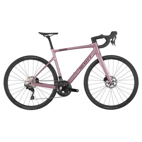 A Scott Addict 50 bike 2025 in a muted pink color with drop handlebars disc brakes and a sleek frame design