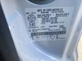 Label on the driver side door jamb of a 2014 Ford F-250 SD showing manufacturing details and weight specifications