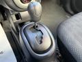 Gear shift of a 2012 Mitsubishi I-MiEV displaying positions P R N D Eco and B